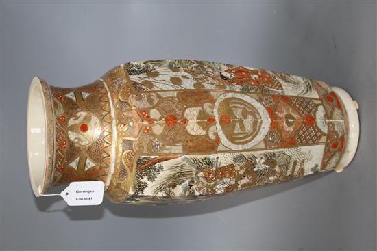 A Satsuma hexagonal vase, decorated with panels of figures in landscapes, height 46cm